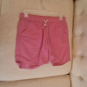 Hot pink girls drawstring shorts with side and back pockets